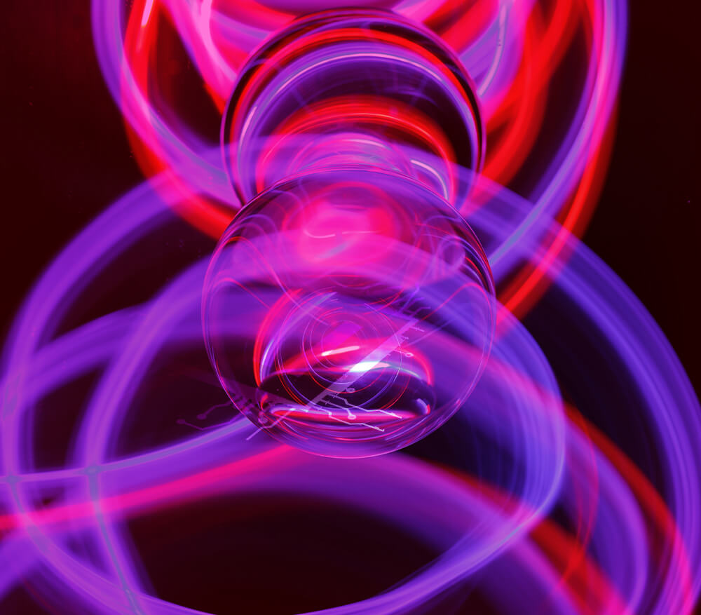 ready-enablement Closeup of lightbulb in a purple background